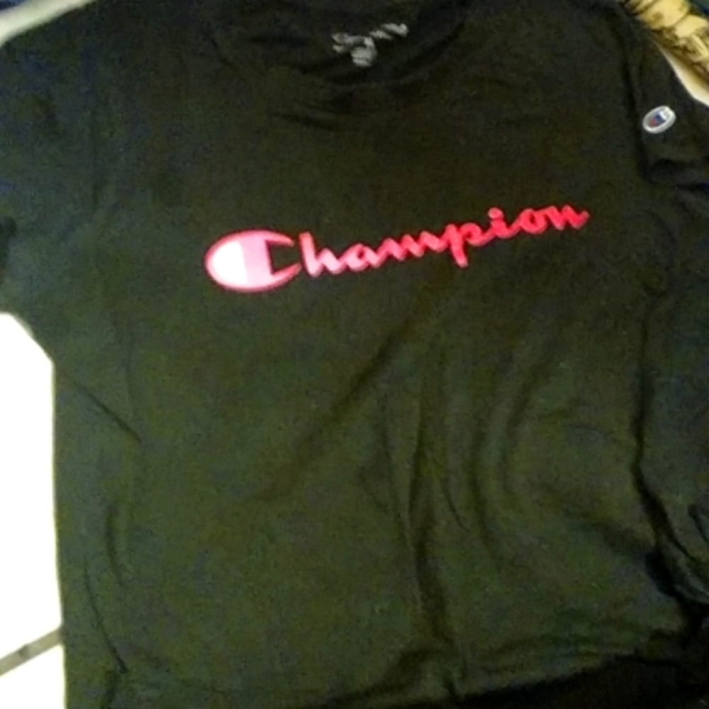 A black and pink shirt from champion